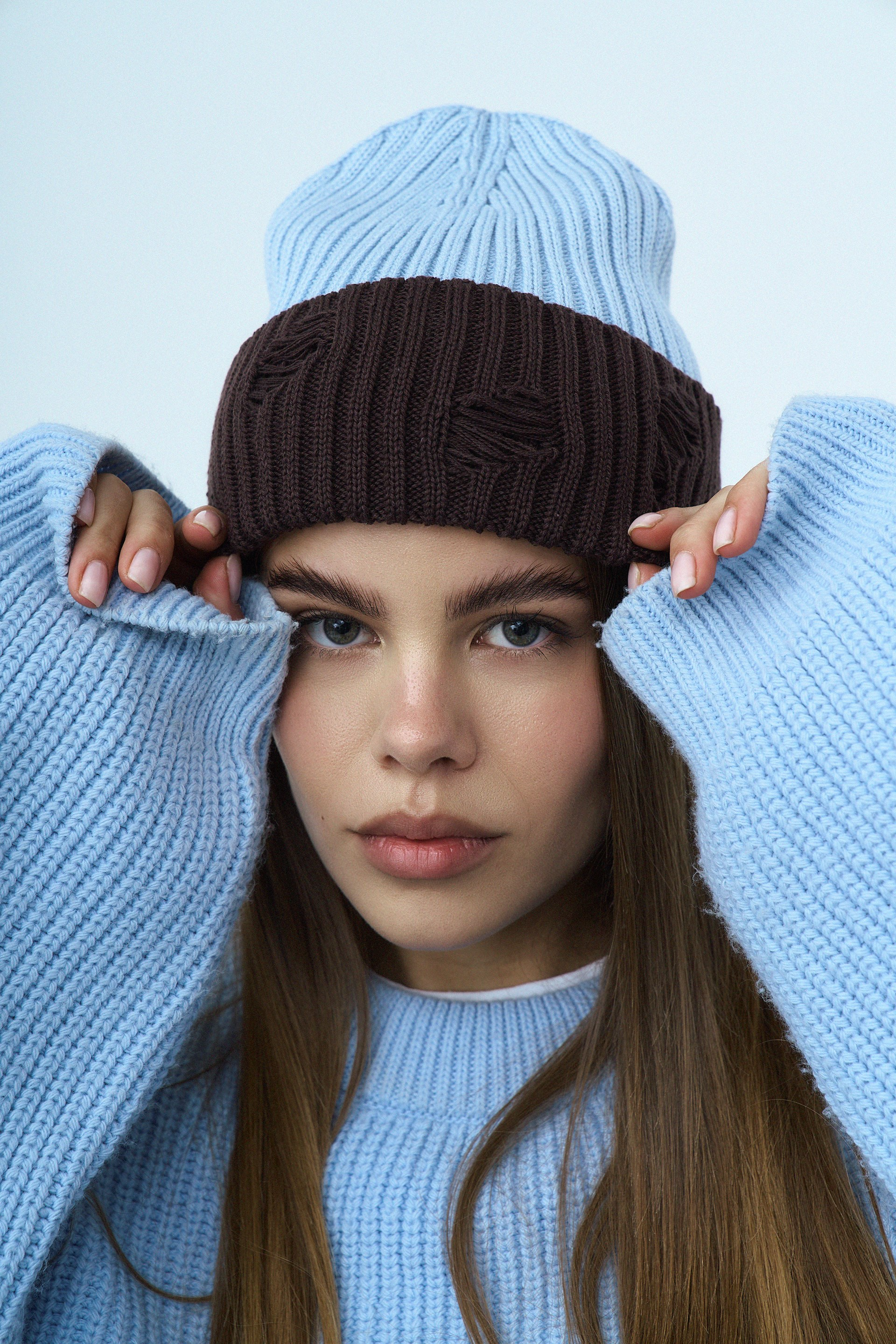 Шапка блакитно-коричнева