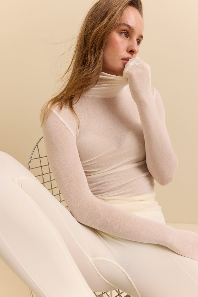 Гольф вовняний прозорий Rue молочний