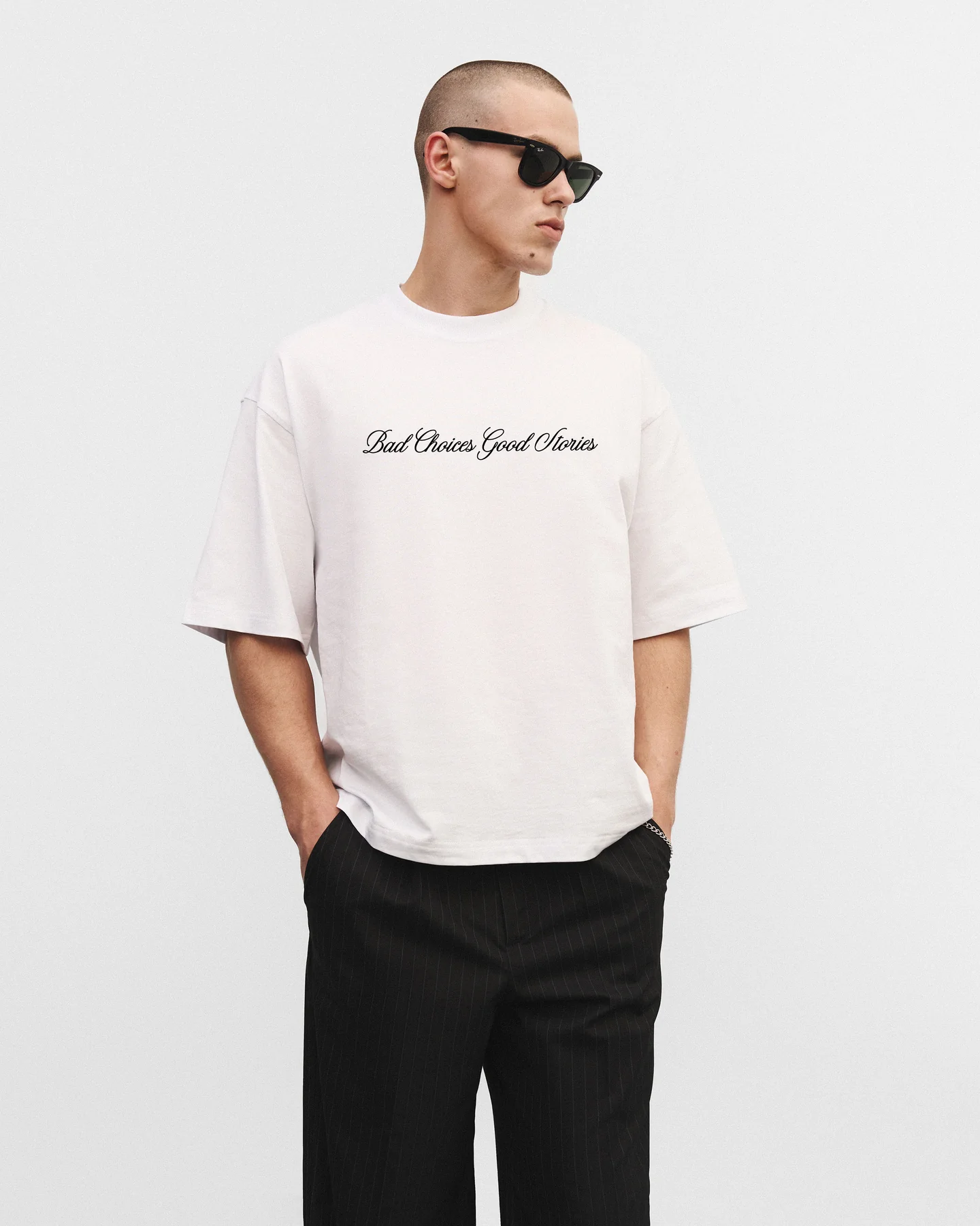Біла оверсайз футболка “Bad choices, good stories”