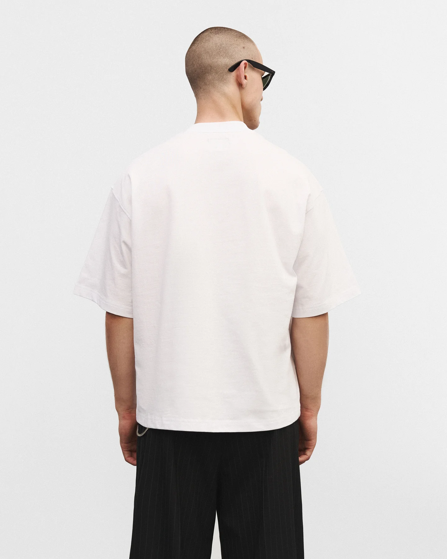 Біла оверсайз футболка “Bad choices, good stories”