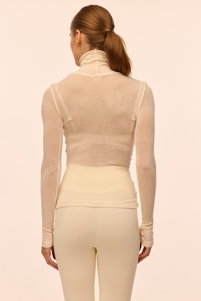 Гольф вовняний прозорий Rue молочний